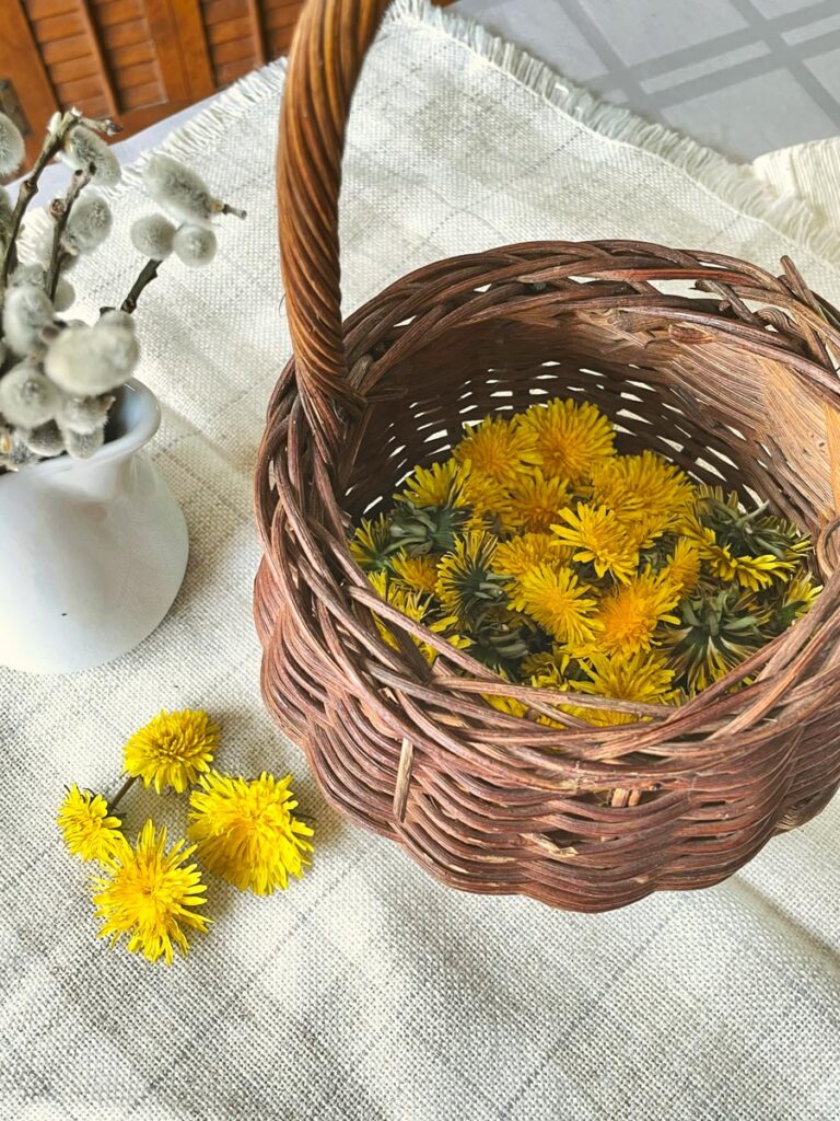 Dandelion flowers in a wicker basket