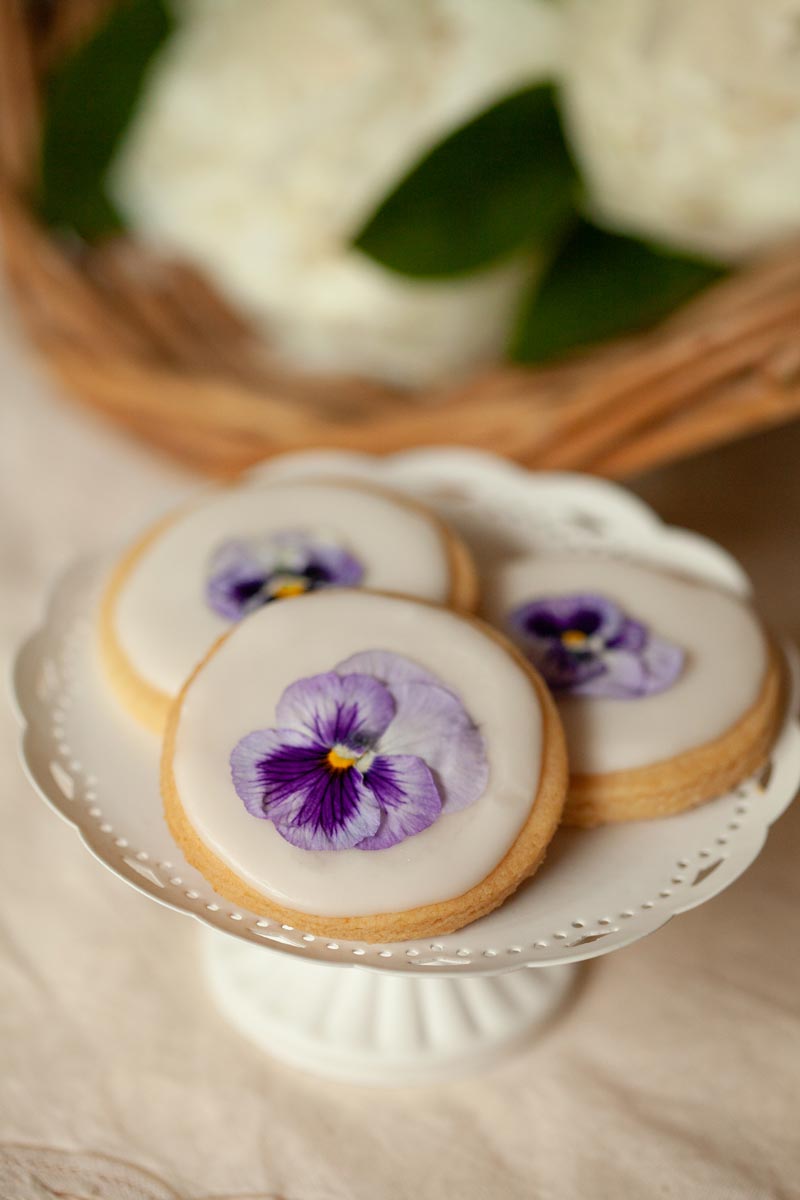 cookies with violets on tray