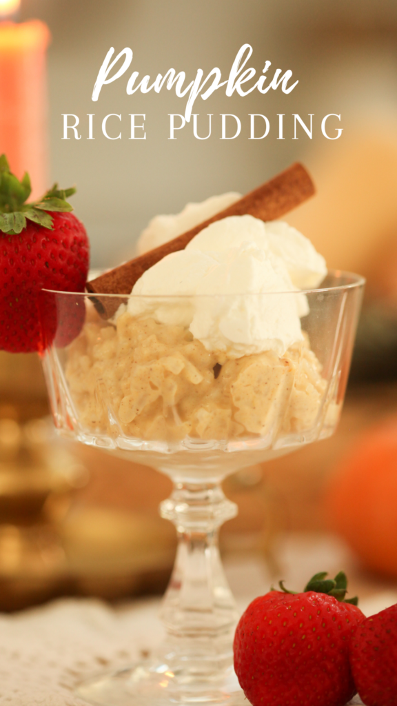 rice pudding in a glass with strawberries and whipped cream